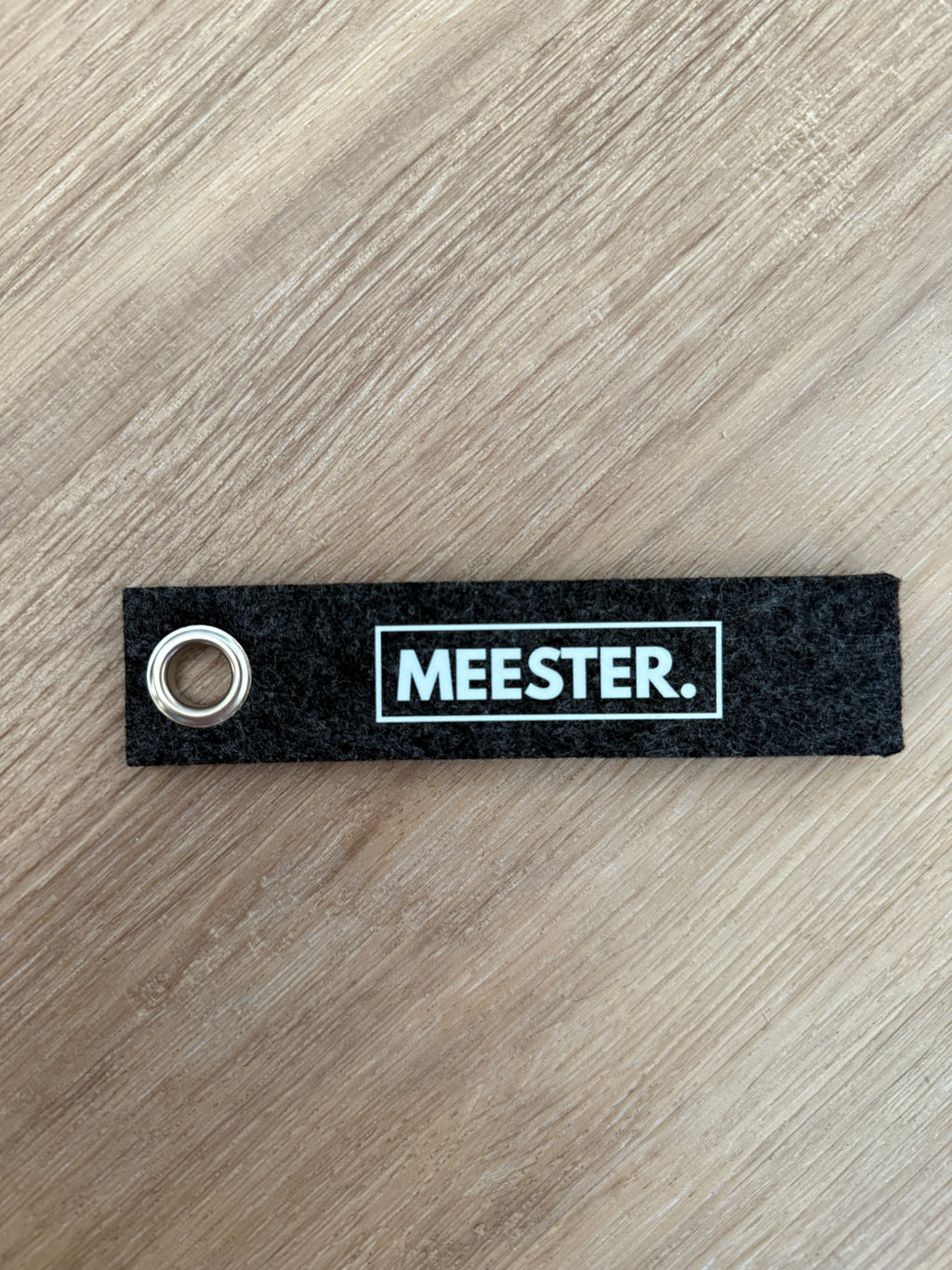 MEESTER. Sleutelhanger