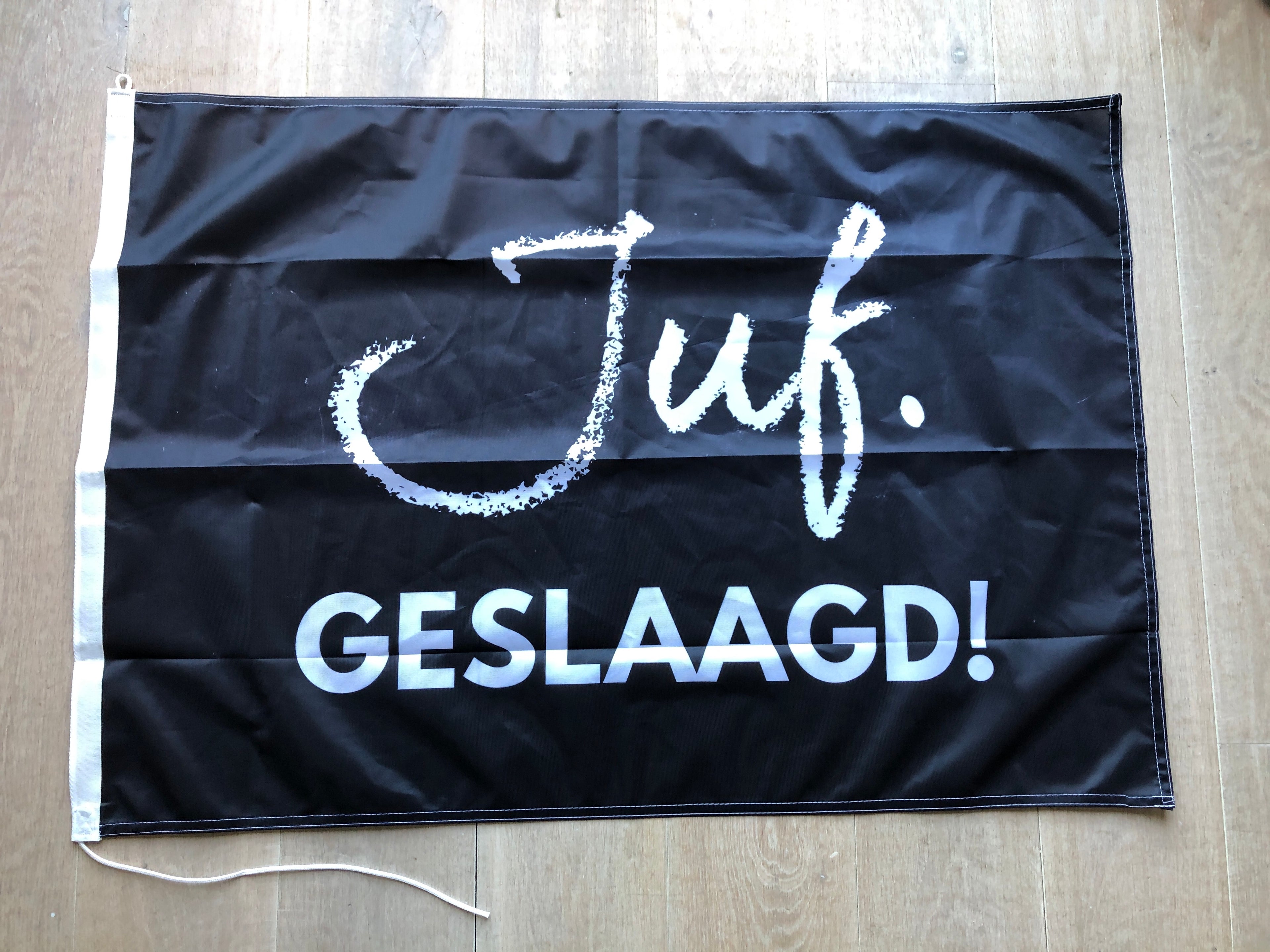JUF. geslaagd vlag